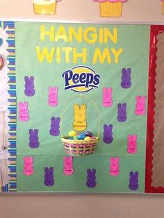 an easter bulletin board with peeps on it