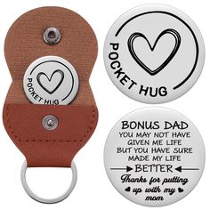 two buttons and a keychain with the words, you may not have given me life but you have sure made my life better