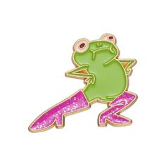 a green frog sitting on top of a pink and purple glittered object with its legs crossed