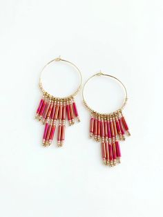 Modern fringe hoop earrings could be your next go to earring. They are super light weight, will give a pop of color to your outfit, and have just the right amount of movement. Colors in earring: dark pink, light pink, gold. Fringe Hoop Earrings, Amazonite Necklace, Mother Of Pearl Earrings, Gold Filled Hoops, Spike Earrings, Bugle Beads, Gold Ribbons, Beaded Hoops, Pink Light