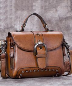 Classy Brown Rivet Durable Genuine Calf Leather Tote HandbagThis bag is made of fine Calf Leather fabric.Measurement: 21.5cm/8.385" * 16cm/6.24" * 10.5cm/4.095"Zip up closure. Inside pockets. Brown Leather Backpack Purse, Ladies Designer Handbags, Soft Leather Handbags, Brown Leather Backpack, Leather Backpack Purse, Handbags Leather, Leather Handbags Tote, Designer Handbag, Tote Handbag