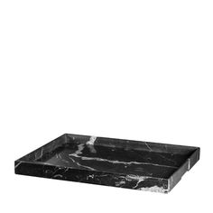 a black marble tray on a white background