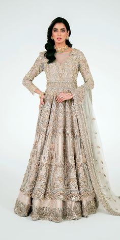 Embellished Lehenga Gown Style Pakistani Bridal Dress is a breathtaking attire adorned with embroidery and shimmering details. Crystals, cut-dana, pearls, sequins, and motifs make this premium Pakistani Wedding Dress an epitome of beauty and your foremost priority for the big day. Hand Embellished Anarkali Dress For Eid, Anarkali Hand Embellished Semi-stitched Dress, Sequin Gown For Eid Reception, Festive Glamorous Gown With Resham Embroidery, Glamorous Festive Gown With Resham Embroidery, Bollywood Semi-stitched Hand Embellished Dresses, Hand Embellished Floor-length Dress For Eid, Bollywood Designer Dresses With Sequins, Hand Embellished Semi-stitched Maxi Dress