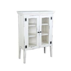 an old white cabinet with glass doors and shelves on the bottom, against a white background