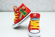 How adorable are these Elmo inspired converse! The perfect shoe to complete the look! Please leave your name needed in the notebox during checkout If you are unsure of sizing please scroll to the last photos for our size charts, or visit our size charts here--> https://pinktoesnhairbows.com/pages/size-chart All sales are FINAL, Ship dates can be found directly on the listing, please view our policies in detail here---> https://pinktoesnhairbows.com/pages/policies-terms-conditions Customizable Cute Low-top Sneakers, Customizable Cute Lace-up Sneakers, Cute Customizable Lace-up Sneakers, Customizable Lace-up Cute Sneakers, Elmo Shoes, Elmo Birthday Party Boy, Baby Elmo, Shark Shoes, Overalls Boys