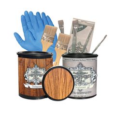 the paint can has blue gloves on it and is next to two cans with different items in them