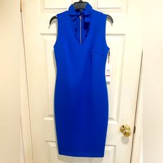 Brand New With Tags Calvin Klein Dress For Date Night In Spring, Calvin Klein Blue Evening Dress, Elegant Blue Calvin Klein Dress, Calvin Klein Blue Formal Dress, Calvin Klein Blue Sheath Dress, Calvin Klein Blue Midi Length Dress, Calvin Klein Blue Mini Dress For Spring, Calvin Klein Blue Midi Dress, Calvin Klein Blue Midi Dress For Formal Occasions