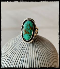 Vintage Native American turquoise ring size 6 1/4 Gorgeous ring with incredible turquoise stone...oval shape, greenish tone and rich warm tone matrix...sterling silver setting, nice frame! Good vintage condition, lovely ring! Measurements : size 6 1/4 sterling silver turquoise : 6/8" X 3/8" top : 15/16" X 0.5" 5.3 g. Southwestern Green Oval Turquoise Ring, Untreated Oval Turquoise Ring, Oval Turquoise Emerald Ring For Collectors, Southwestern Oval Green Rings, Southwestern Green Oval Rings, Southwestern Style Green Oval Ring, Green Oval Ring With Patina, Vintage Green Turquoise Oval Cabochon Ring, Untreated Oval Turquoise Ring For Anniversary