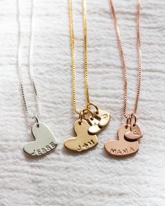 "HEART PENDANT NECKLACE * HEART PENDANT + TINY INITIAL HEART PENDANTS NECKLACE personalize our heart pendant necklace with up to 5 letters on the large heart pendant plus the option to add additional tiny heart initial pendants. Uppercase letters, numbers, + or & Big heart max characters: 5 Tiny heart max characters: 1 details: sterling silver, 14k gold filled or 14k rose gold filled * large heart: 12x14mm * tiny heart: 6x8mm * box chain with spring clasp in 16\", 18\" or 20\" Ready to gift in o Initial Heart Necklace, 3 Hearts, 2 Hearts, Necklace Mom, Pendants Necklace, Heart Pendants, Necklace Initial, Hearts Necklace, Large Heart