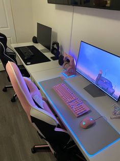 a desk with a keyboard, mouse and monitor on it