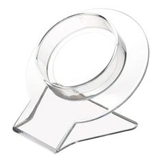 a glass trophy with a metal base and a circular design on the top, in front of a white background