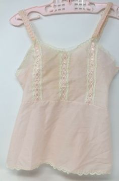 Vintage Girls Toddlers Pink Cotton Dress Slip Petticoat With Lace & Ribbon Trim In good vintage condition, with light stain on back Please view pics as they are part of the description Measures approx 15 1/2" long, by 11" arm pit to arm pit, 9 1/2" across waist  Please check out my feedback and bid with confidence. I will be listing other vintage items, and I happily combine shipping in the US! Pink Vintage Clothes, Cute Fitted Camisole For Party, Fitted Ruffle Camisole Dress, Fitted Camisole Dress With Ruffles, Retro Summer Costume Dress, Cute Summer Party Sleepwear, Vintage Lace Trim Camisole For Spring, Daywear Camisole Dress With Lace Trim, Spring Sleepover Dresses With Lace Trim