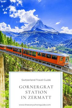 a red train traveling over a bridge with mountains in the background and text that reads, gornergrat station in zermatt