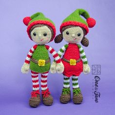 two crocheted dolls are standing next to each other on a purple background,