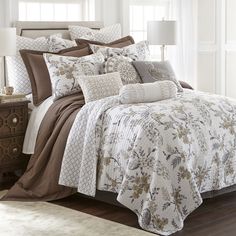 the comforter is neatly made and ready to be used in this bedding set