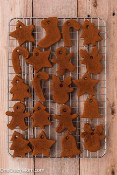 some cookies are on a cooling rack and ready to be baked in the oven for christmas