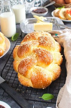 a table topped with bread and other food items