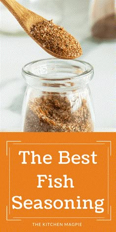 the best fish seasoning recipe in a glass jar with a wooden spoon on top