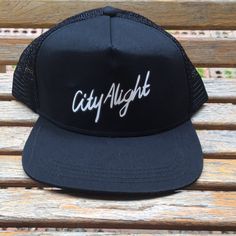 Nwot Cityalight Snapback Trucker Hat. Mesh Back 5 Panel Style Has Some Storage Marks On Brim Black With White Print Logo On Crown Lightweight Cap For Streetwear, Black Urban Trucker Hat For Summer, Urban Black Trucker Hat For Summer, Urban Trucker Hat One Size - Summer, Black Trucker Hat Six-panel, Cotton Six-panel Trucker Hat With Logo Patch, Functional Black Six-panel Trucker Hat, Cotton 5-panel Trucker Hat With Logo Patch, Black Six-panel Trucker Hat With Logo Patch