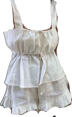 White Matching Set Tops For Pajama Party, White Matching Set Sleepwear For Vacation, White Sleepwear Matching Set For Vacation, White Sleeveless Top For Pajama Party, White Sleeveless Tops For Wedding Night, White Ruffled Beach Set, White Ruffled Beachwear Set, Sleeveless White Top For Wedding Night, White Matching Set Tops For Beach