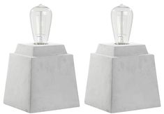 pair of white marble lamps on pedestals with clear glass bulb holders, set of 2