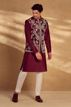 Maroon bundi with all-over animal patterns and welt pockets. Comes with kurta and pant. - Aza Fashions Eid Long Sleeve Nehru Jacket With Motifs, Chanderi Long Sleeve Bandhgala For Puja, Nehru Jacket With Motifs For Diwali, Traditional Nehru Jacket With Motifs For Transitional Season, Festive Nehru Jacket With Motifs, Designer Nehru Jacket With Motifs For Diwali, Festive Nehru Jacket With Motifs For Designer Wear, Collar Kurta, Nehru Jacket