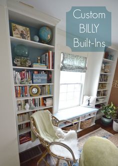 a room filled with lots of books and furniture