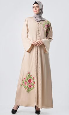 A perfect wardrobe piece for everyday/travel Round neck Double layer abaya Floral Embroidery at front Button down Full Sleeves FABRIC: Crepe CARE: Machine wash cold Traditional Long Sleeve Abaya For Spring, Spring Abaya With Floral Embroidery, Spring Long Abaya With Floral Embroidery, Modest Embroidered Maxi Abaya, Embroidered Modest Maxi Abaya, Spring Floral Embroidered Long Abaya, Spring Floral Embroidered Abaya, Eid Long Sleeve Abaya With Floral Embroidery, Eid Abaya With Floral Embroidery And Long Sleeves