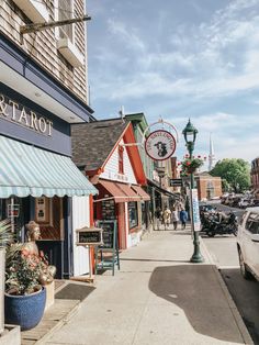 a street scene with focus on the storefronts