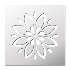 a paper cutout of a flower on a white background