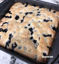 blueberry cobble cake in a pan on the counter