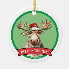 a christmas ornament with an image of a moose wearing a santa claus hat