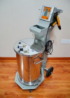 a machine that is sitting on top of a wooden floor