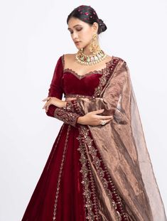 Editor's Note Maroon Double Tier Lehenga With Sweetheart Full Sleeve Blouse Fabric: Velvet, Tissue Components: Lehenga, Blouse And Dupatta Color: Maroon Care: Dry Clean Only About the Designer Vvani by Vani Vats- an Indian ethnic women’s wear label. It is a depiction of the royal and intricate handcrafted embroideries in unconventional designs. Lehenga Simple, Full Sleeves Blouse Designs, Velvet Blouse Design, Maroon Lehenga, Vani Vats, Velvet Dupatta, Simple Lehenga, Full Sleeve Blouse, Lehenga Designs Simple