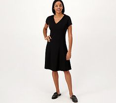 This pebble knit dress flows with chicness, providing your warm-weather wardrobe with a stylish option for when you want to dress to impress. From Isaac Mizrahi Live!TM. Versatile V-neck Fitted Dress, Versatile Fitted V-neck Dress, Solid Color Knit Summer Dresses, Solid Knit Summer Dresses, Versatile Fitted Short Sleeve Dresses, Versatile Short Sleeve Summer Dress, Versatile Fitted Dress With Short Sleeves, Casual V-neck Midi Dress With Flattering Silhouette, Chic Knit Short Sleeve Dresses