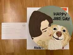 there is a paper cut out of a man and his dog that says happy jake day