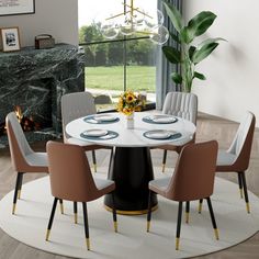 a dining table with chairs around it in front of a fire place and large window