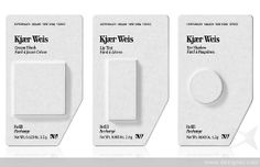 three white tags with black and white labels on the front, one for kafer weis