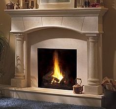 a fireplace with a fire burning in it's mantle next to a potted plant