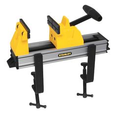 the stanley table saw is attached to a stand with two vices on each side