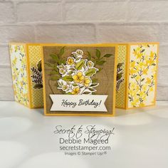 a close up of a card with flowers on it