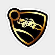 a black and gold sticker with an image of a buggy on it's side