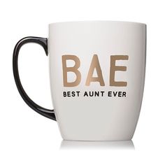 a black and white coffee mug with the words bae best aunt ever printed on it