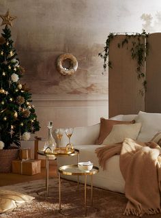 a living room filled with furniture and a christmas tree