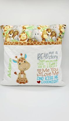 a giraffe pillow with the words read me a story and some animals on it