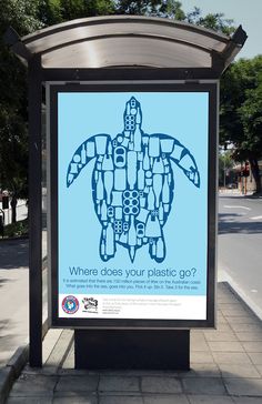 a bus stop sign with a sea turtle on it's back and the words where does your plastic go?