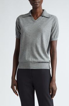 Luxuriously soft cashmere and silk yarns nod to the NYC-based label's focus on impeccable materials in a polo-style sweater topped with a wide johnny collar. 22" length (size medium) Johnny collar Short sleeves Ribbed cuffs and hem 70% cashmere, 30% silk Dry clean Imported Designer Clothing Classic Fitted V-neck Polo Sweater, Luxury Fitted Cashmere Tops, Luxury Wool Sweater For Work, Elegant Merino Wool Sweater For Work, Modern Wool Top For Workwear, Formal Fine Knit Cashmere Tops, Fitted Cashmere Top For Business Casual, Fitted V-neck Polo Sweater For Work, Fitted Cashmere Top For Work