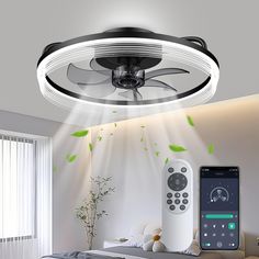 a ceiling fan with remote control in the living room