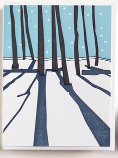 a card with trees and snow on it