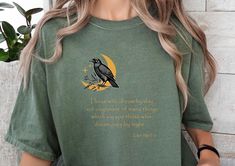 Unleash your literary spirit with our Edgar Allen Poe Literature T-shirt! Perfect for bookworms and English teachers alike, this unique tee celebrates the beauty of literature--a thoughtful gift for any book lover or literary enthusiast. Welcome to OVERRJOY! * Q U I C K * F A C T S * ✺ 100% preshrunk cotton ✺ Wash and dry normally (on cool for best results) * S I Z I N G * ✺ Sizing is relaxed fit - Comfort Colors. ✺ Most women find their typical size works best, since they are meant to fit a tou Screen Print Short Sleeve Tops, Literary Style Short Sleeve Screen Print Tops, Screen Print Crew Neck T-shirt, Relaxed Fit Graphic Print Shirt In Bookish Style, Relaxed Fit Graphic Print Shirt With Bookish Style, Literary Style Cotton T-shirt With Relaxed Fit, White Literary T-shirt With Letter Print, Literature Tshirts, Black Literary T-shirt With Letter Print